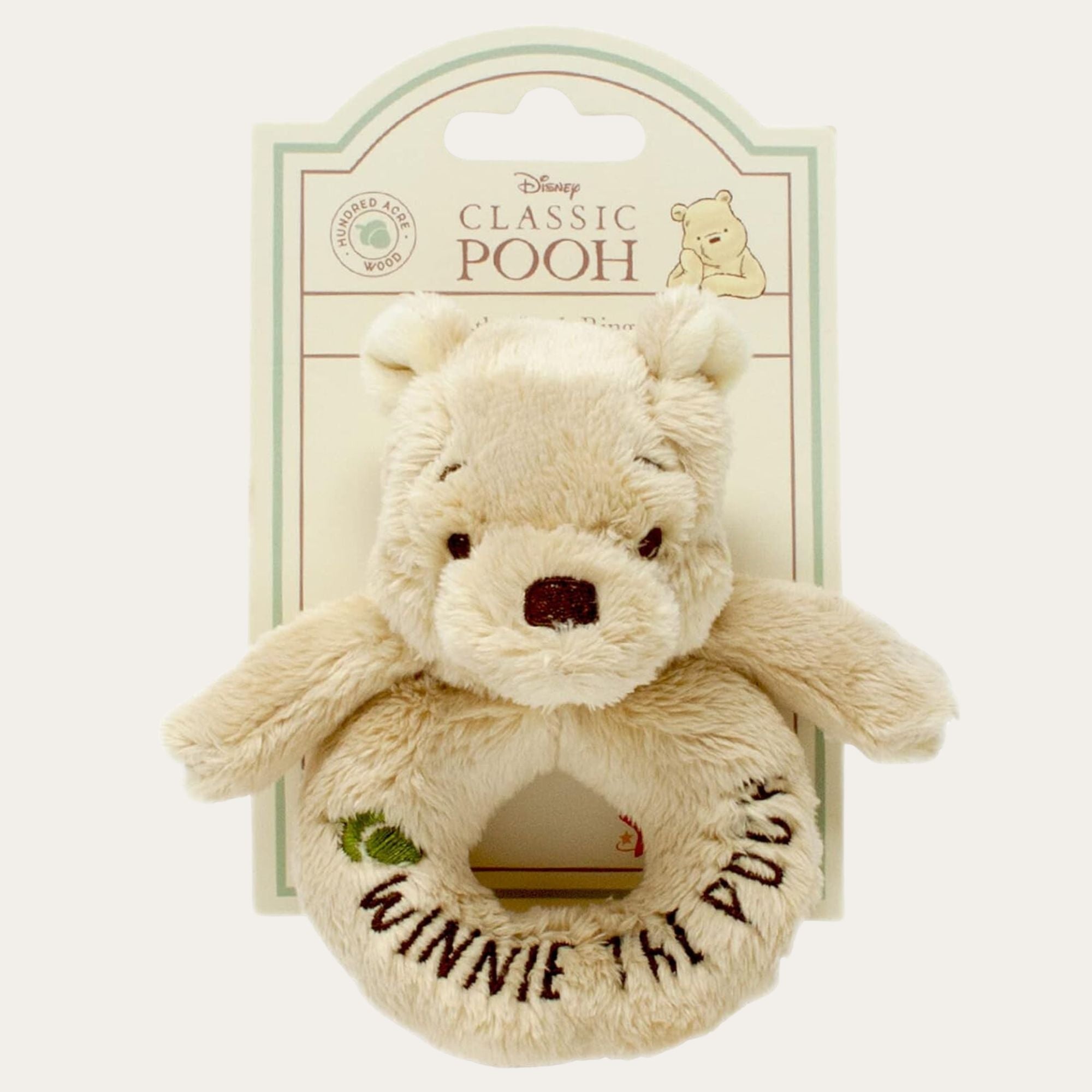 Winnie the Pooh soft toy baby ring rattle.