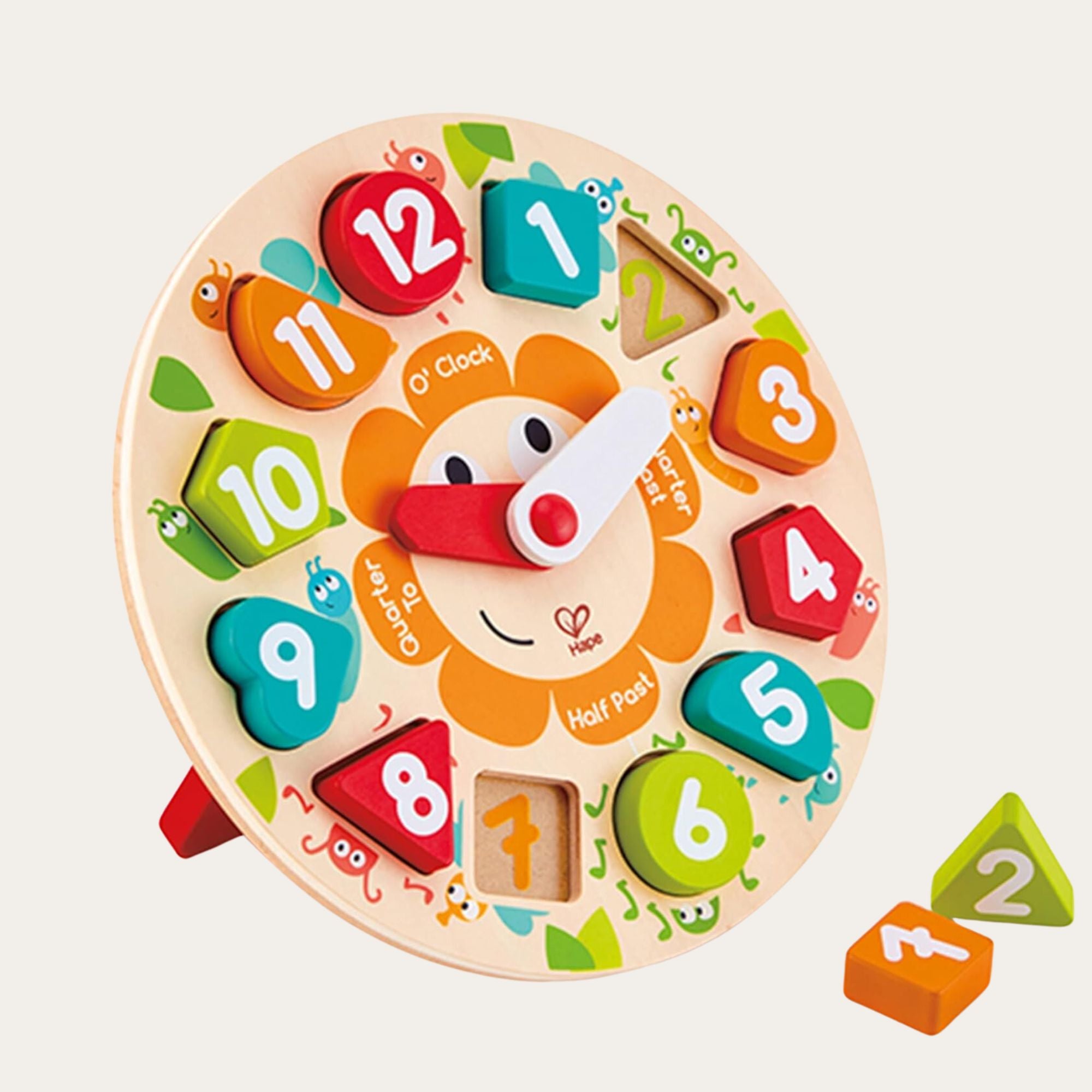 Wooden clock shape sorting puzzle toy with happy face design and moveable hands.