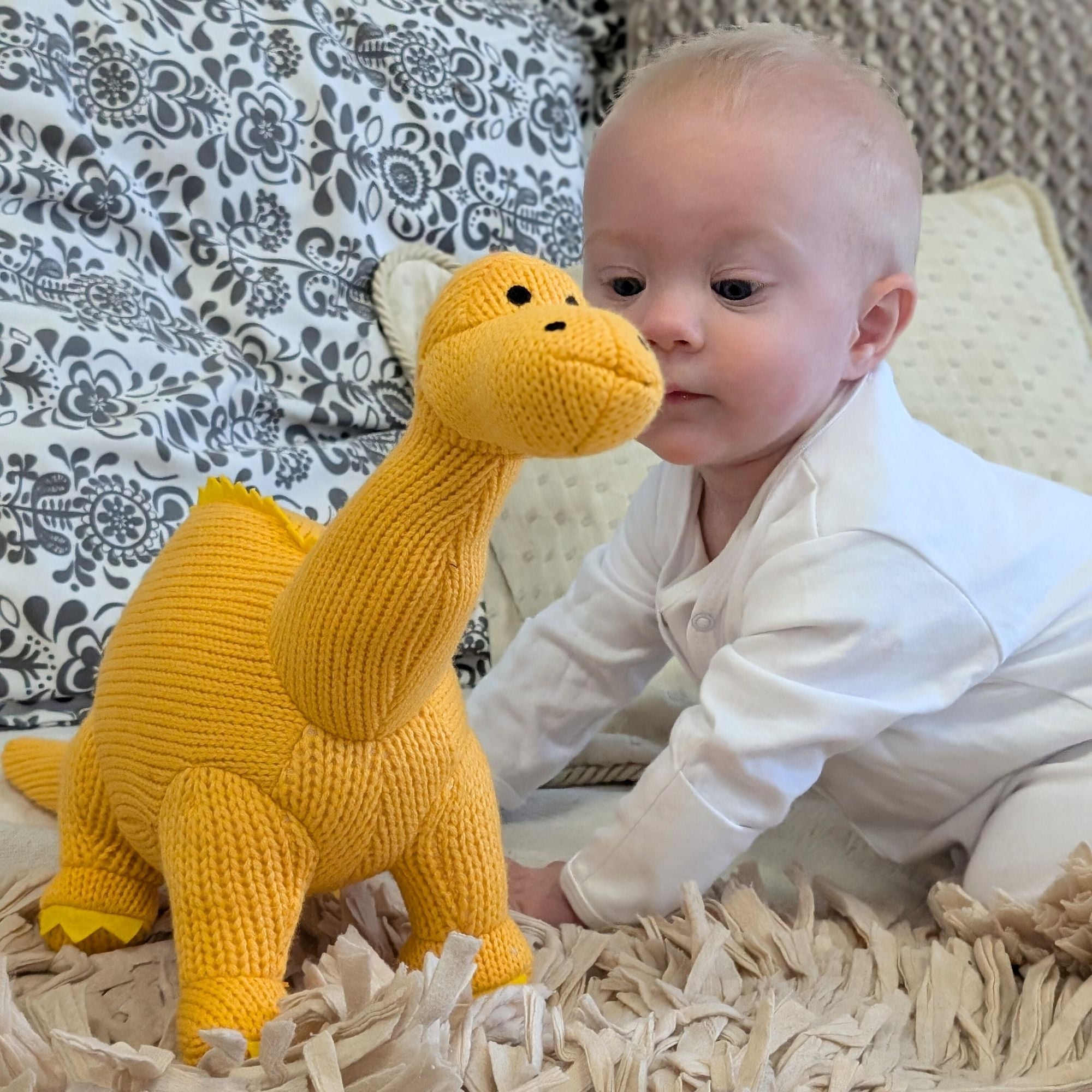 yellow knit dinosaur organic