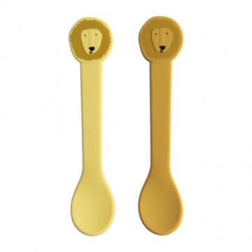 Yellow Lion silicone baby spoons with friendly face design and stainless steel core; sturdy, BPA-free, dishwasher safe, ideal for ages 4 months+