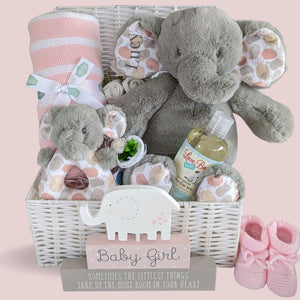 New born baby girl gifts hamper with baby blanket, elephant soft toys and organic baby wash.