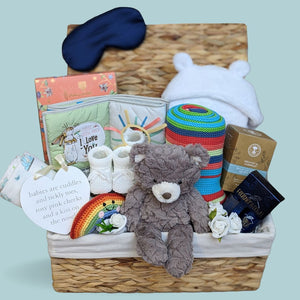 New mum hamper gifts basket, with pamper treats for mum and gifts for the new baby. 