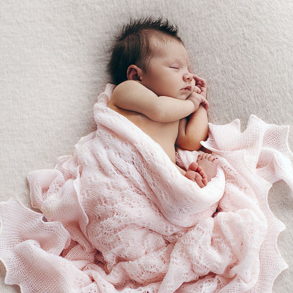 Super soft lacy knit baby shawl blanket in soft pink