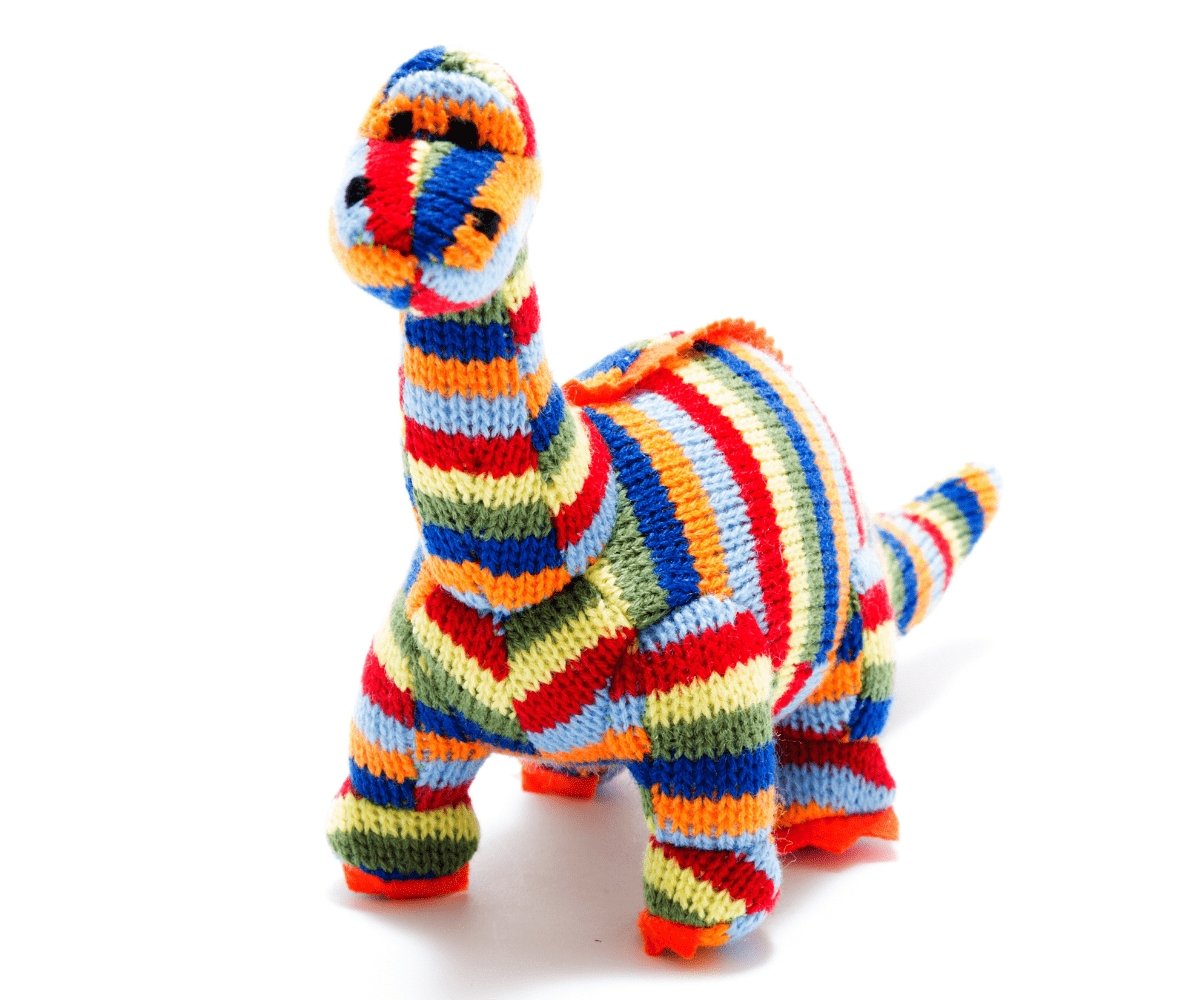 Rainbow Striped Knitted Diplodocus Dinosaur Rattle for a baby. 